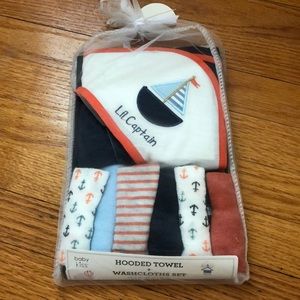 New in bag Hooded Towel and Washcloth Set
